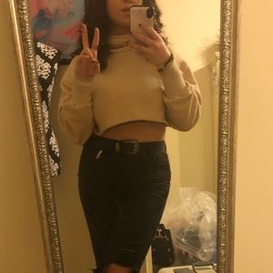 Cropped beige turtleneck sweater